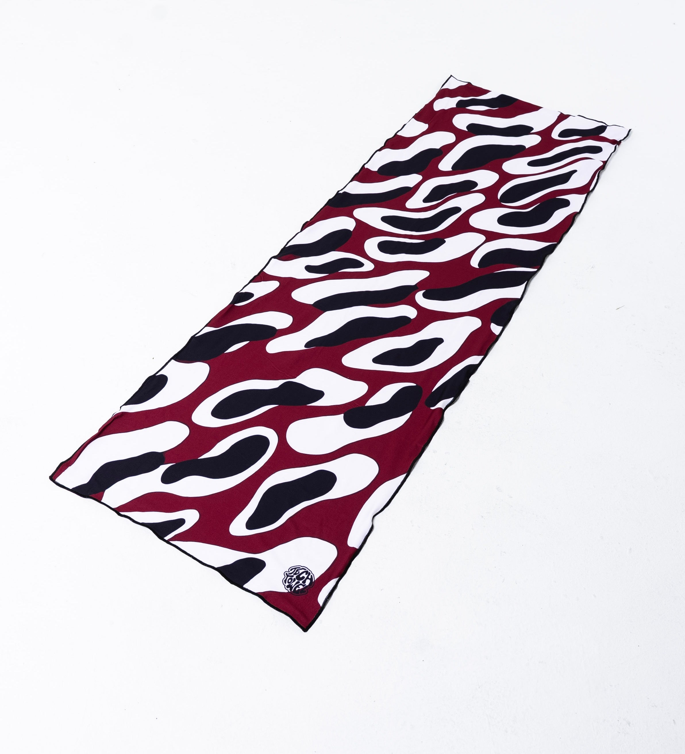 Tech Towel laid flat to show the full graphic and proportions